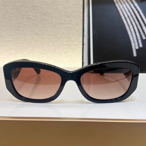 CHANEL Black Sunglasses with Gold Accents - Picture 3 of 4